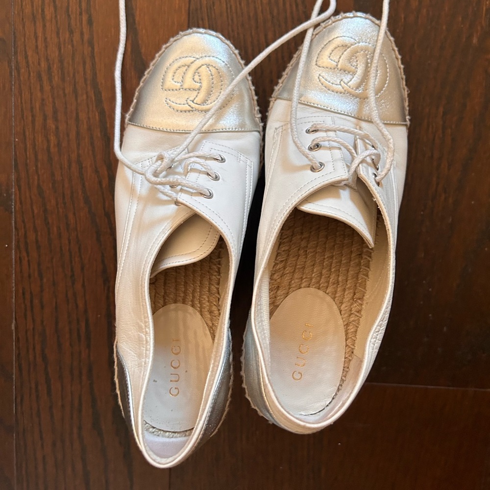 White and silver Gucci shoes in excellent condition